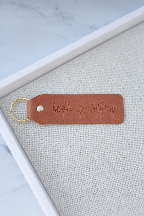 Load image into Gallery viewer, Buckle Up Buttercup Leather Keychain - Multiple Variations Available
