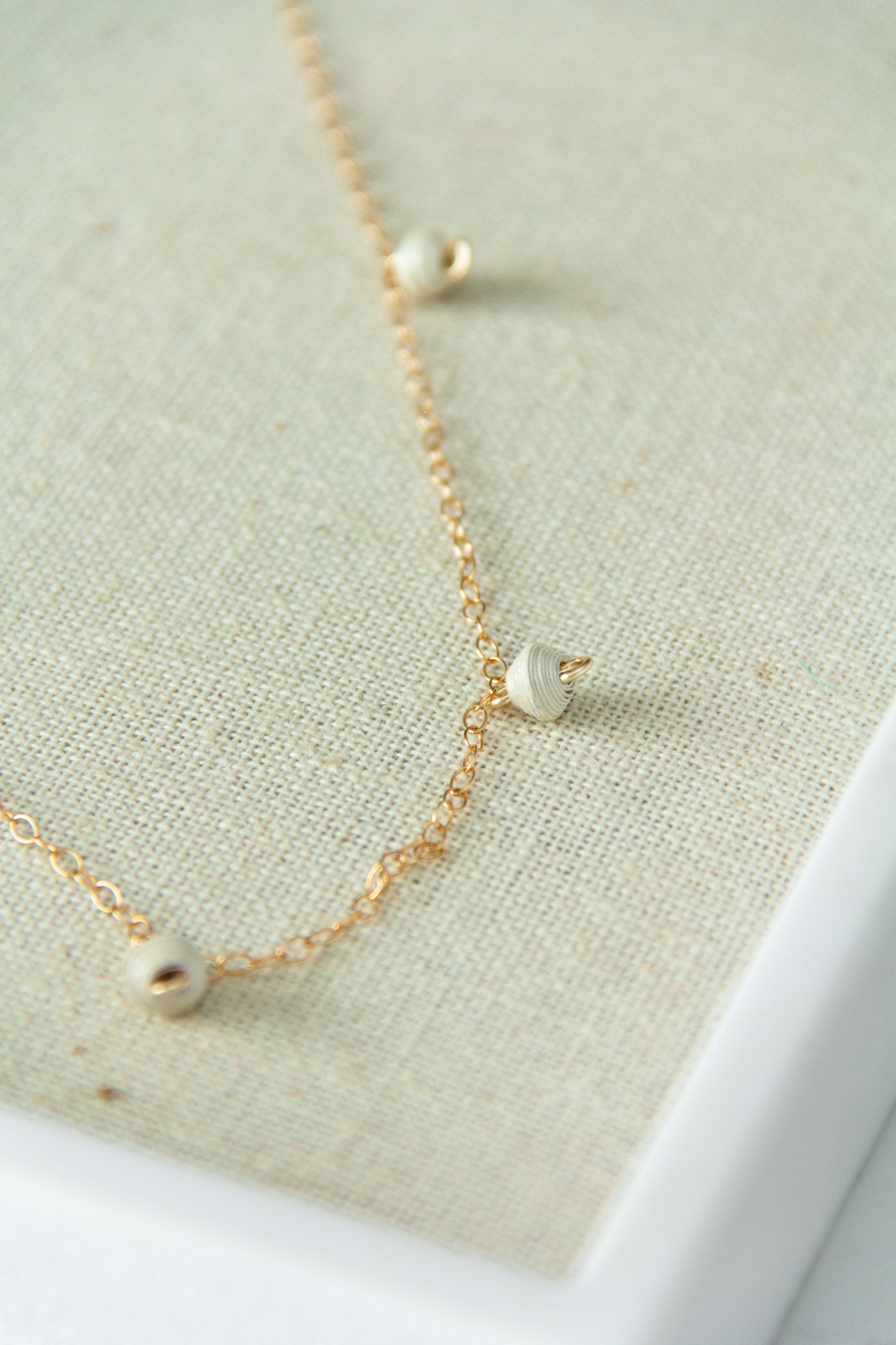 The Neima Tiny Bead Drop Necklace